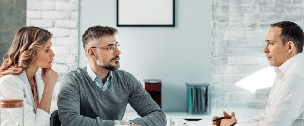 A person consulting with a financial advisor