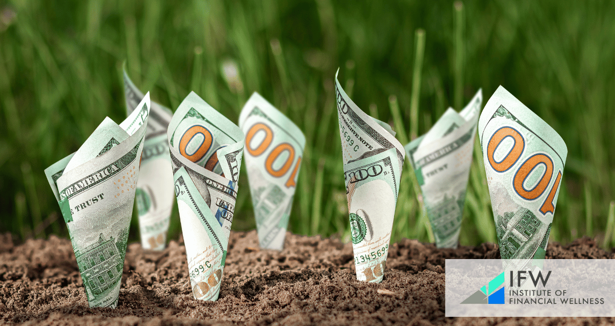 Several dollar bills planted on the ground