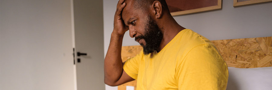 A man dealing with credit or debit card fraud
