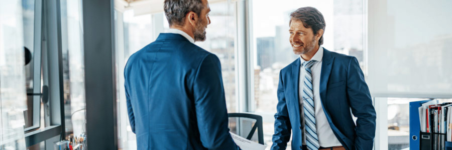 Business partners discussing their joint brokerage account