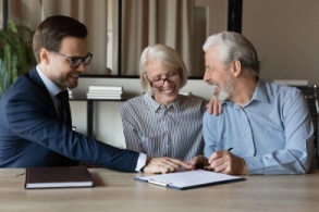 Senior couple working with a financial advisor